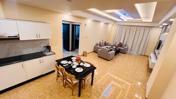 Appartement Deluxe, 2 chambres | Coin séjour