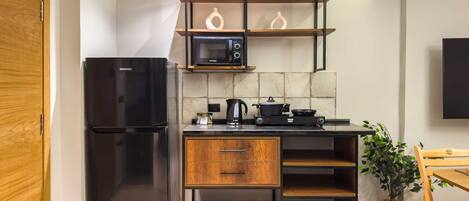 Basic Apartment, 2 Bedrooms | Private kitchen | Fridge, microwave, oven, stovetop