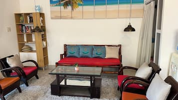 Villa Deluxe, cuisine, vue jardin | Coin séjour