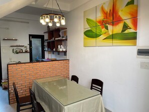 Deluxe Villa, Kitchen, Garden View | Living area - Blue Beach Village (Da Nang)