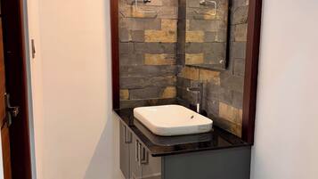 Shower, bidet, towels, soap