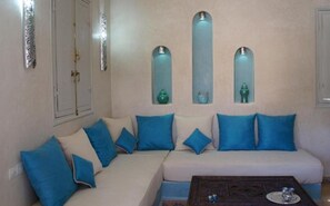 Family Quadruple Room, Pool View (Kenza) | Individually decorated, individually furnished, iron/ironing board - Riad Jardin des Orangers (Sidi Borja)