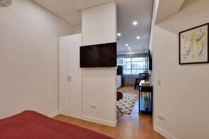 1 chambre, coffres-forts dans les chambres, fer et planche Ă repasser
