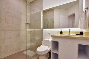 Shower, hair dryer, towels, soap