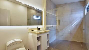 Shower, hair dryer, towels, soap