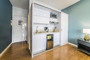 Fridge, microwave, stovetop, coffee/tea maker