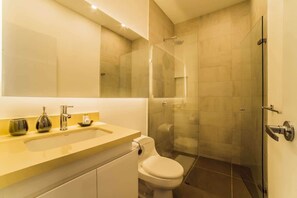 Shower, hair dryer, towels, soap
