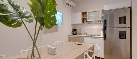 Microwave, coffee/tea maker, cookware/dishes/utensils