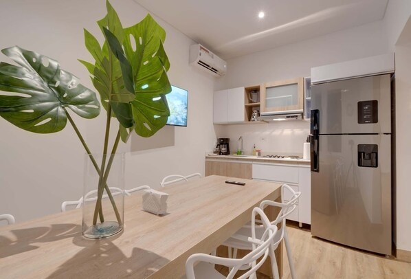 Microwave, coffee/tea maker, cookware/dishes/utensils