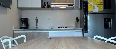 Microwave, coffee/tea maker, cookware/dishes/utensils