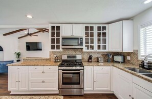 Microwave, oven, stovetop, dishwasher - Heights Bungalow w/ Huge Yard & Pool Table (Houston)