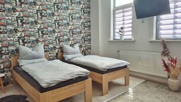 1 bedroom, travel crib, WiFi, bed sheets