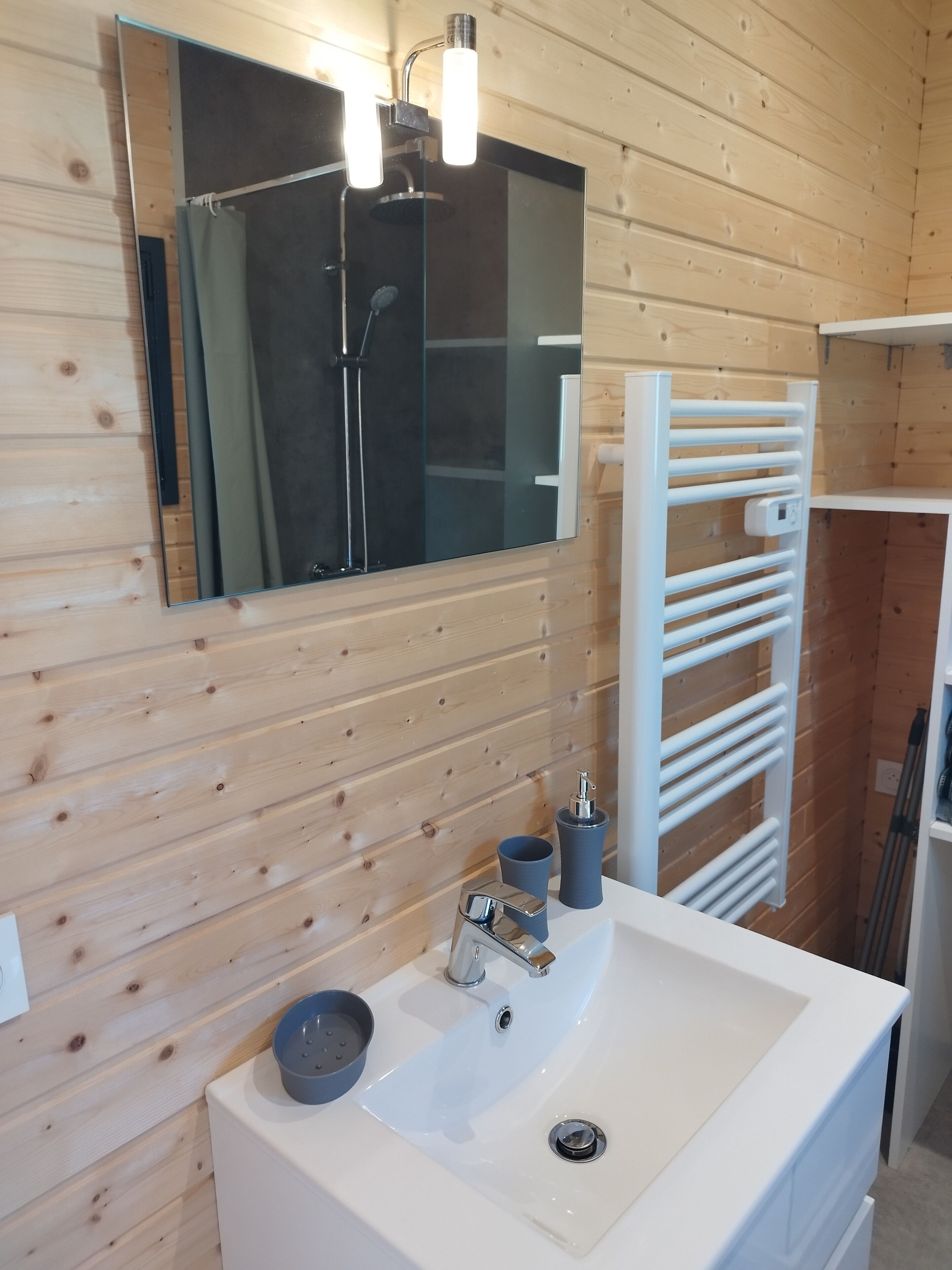 Shower, hair dryer, towels, toilet paper