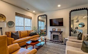 Smart TV, fireplace, DVD player, books