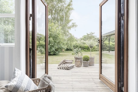 Terrace/patio. Large cozy holiday home with private beach access