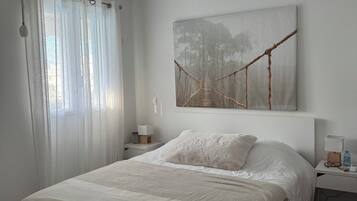 1 habitación, tabla de planchar con plancha, wifi y ropa de cama