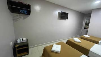 Standard Triple Room | 1 bedroom, laptop workspace, bed sheets
