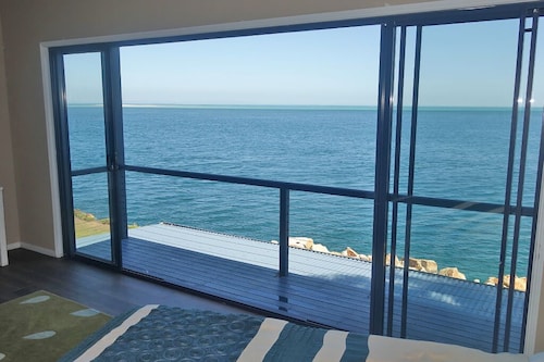 Large waterfront home with bay views to Moreton Island