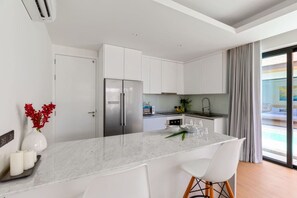 Fridge, microwave, dining tables