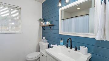 Hair dryer, towels, soap, shampoo