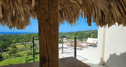 Villa elevated on a hill overlooking a majestic view of the sea