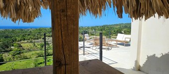 Villa elevated on a hill overlooking a majestic view of the sea