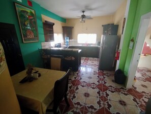 Family Apartment, 2 Bedrooms, Kitchen, Pool View | Private kitchen | Microwave, coffee/tea maker, paper towels, dining tables - See Belize Sea View Vacation Rentals (Belize City)