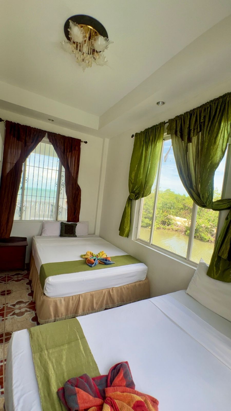 Apartamento família, 2 quartos, vista para a piscina, de frente para o mar | Vista do quarto