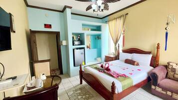 Deluxe Studio, 1 Queen Bed, Balcony, Sea View | Individually decorated, individually furnished, iron/ironing board