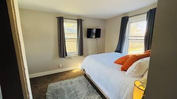 1 bedroom, desk, iron/ironing board, travel cot