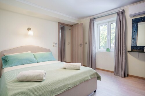 Authentic modern Greek Home with garden close to sea and village city centre