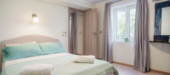 Authentic modern Greek Home with garden close to sea and village city centre