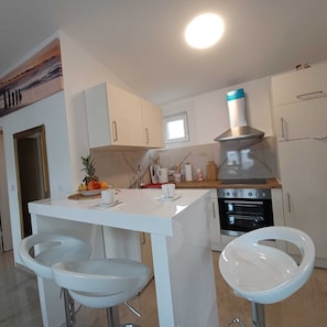 Apartment (Beachfront Apartment with Balcony and) | Private kitchen | Fridge