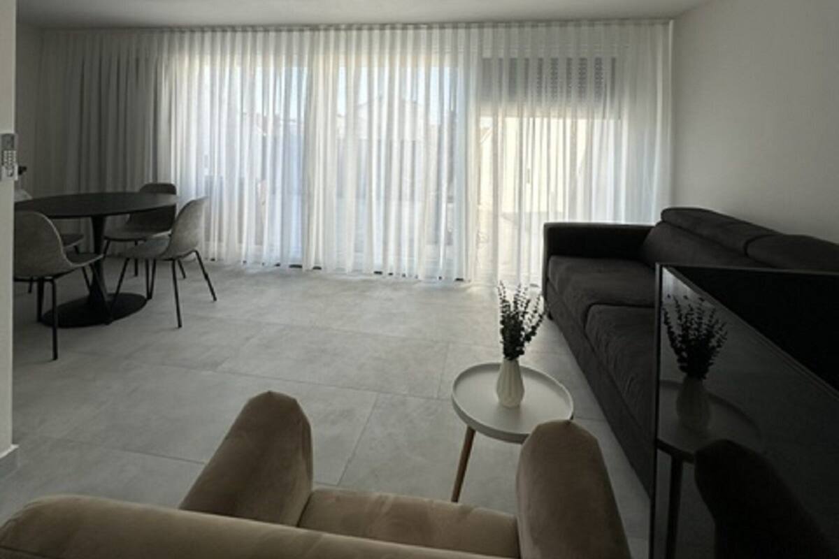 Studio (Studio Apartment with Terrace 2) | Living room | 32-inch flat-screen TV with satellite channels