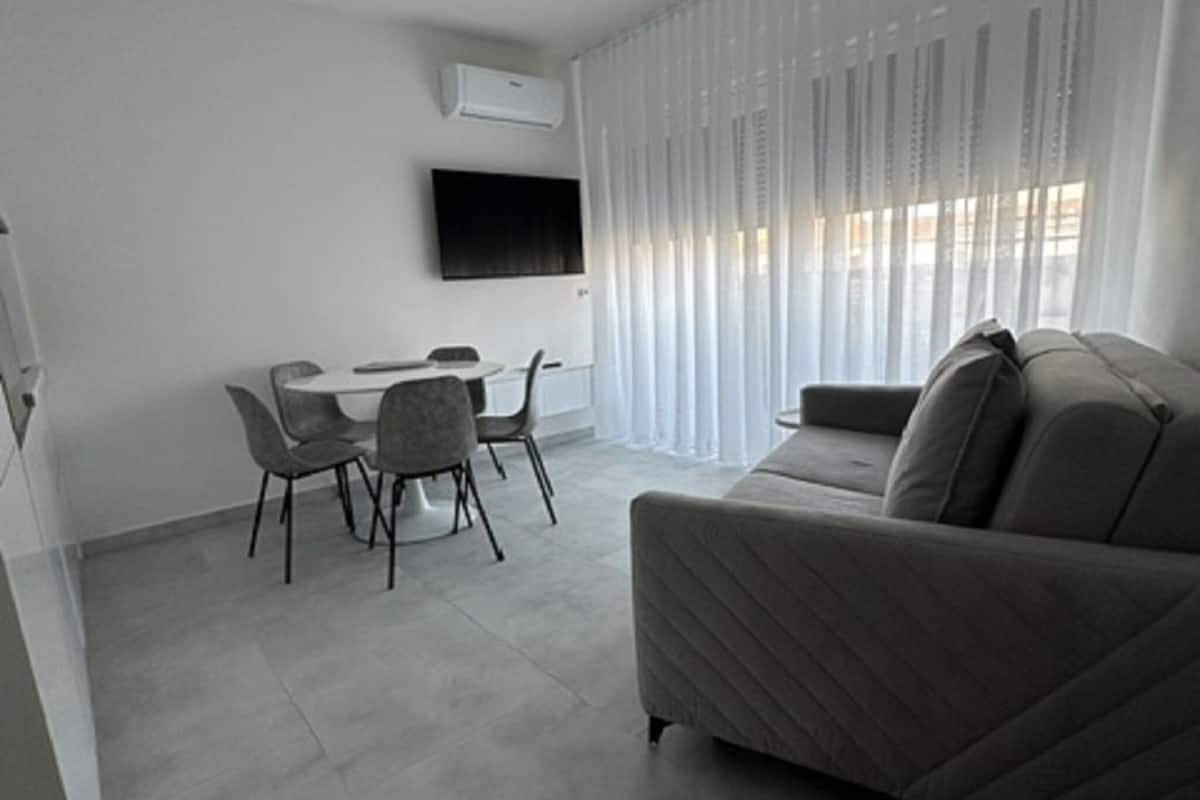 Apartment (Two Bedroom Apartment with Terrace 2) | Living room | 32-inch flat-screen TV with satellite channels