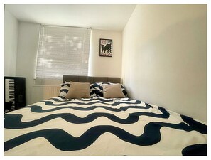 1 habitación, tabla de planchar con plancha, wifi y ropa de cama 
