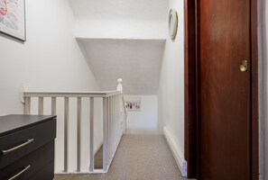 Deluxe Triple Room, Private Bathroom, City View | Living area