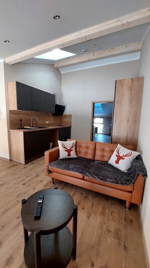 Living area - Oberland vacation apartment Wurmansau incl. Königscard in the Ammergau Alps (Saulgrub)