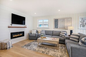 Smart TV, fireplace, books