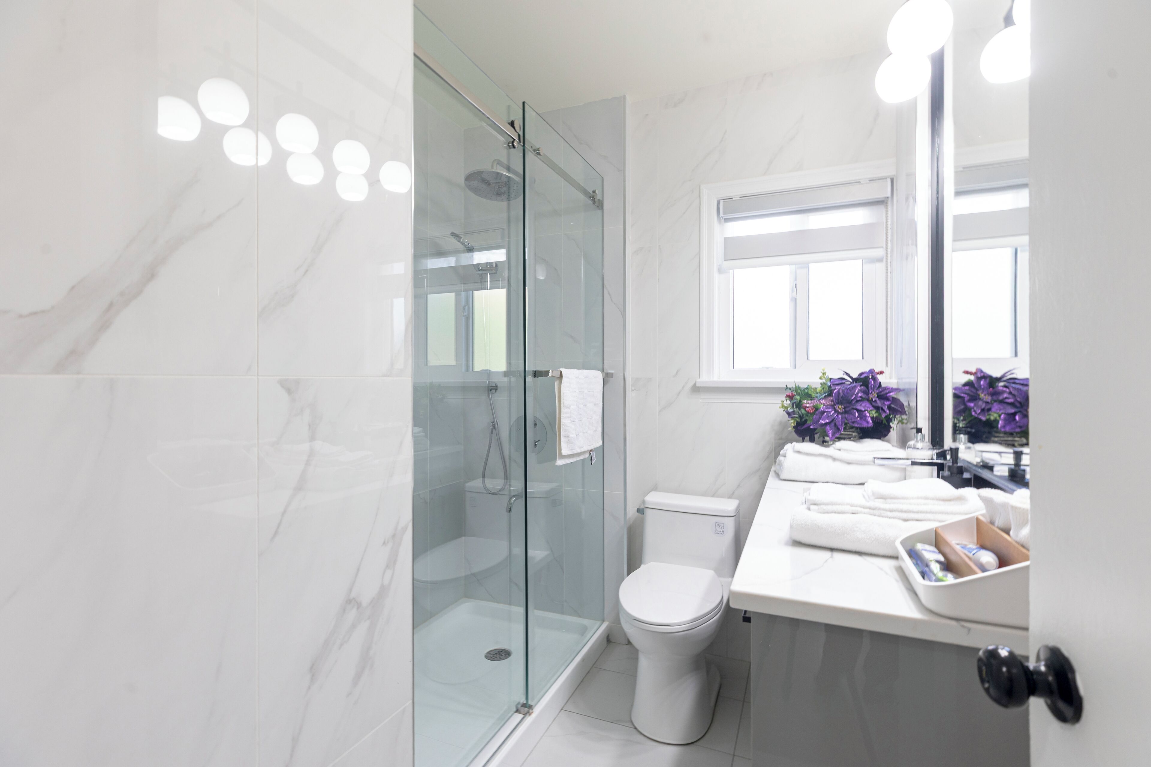 Shower, hair dryer, towels, soap