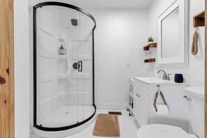 Shower, eco-friendly toiletries, hair dryer, towels