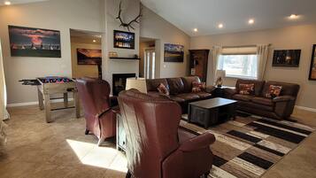 Smart TV, fireplace, video games, foosball