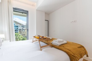 Iron/ironing board, travel crib, free WiFi, bed sheets