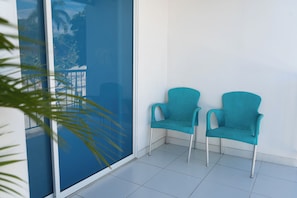 Quarto casal superior, sacada, vista para a cidade | Wi-Fi de cortesia