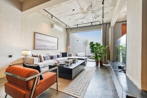 Comfort Chalet, Patio | Living area | Smart TV