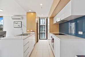Fridge, stovetop, dishwasher, toaster - Two-Bedroom Apartment with Balcony (Belconnen)