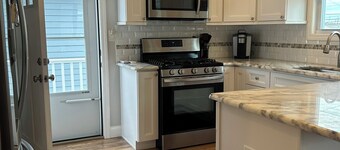 Charming home with water view 2-bedroom & loft and underneath entertaining area.