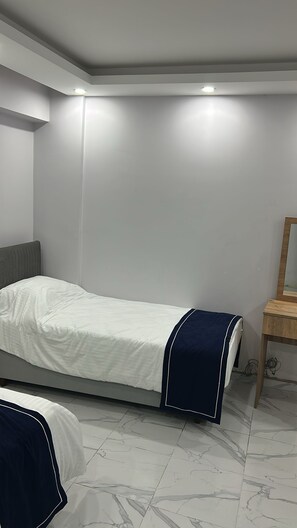2 bedrooms, desk, laptop workspace, iron/ironing board