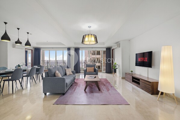 Apartment, 4 Bedrooms, City View | Living area | Flat-screen TV