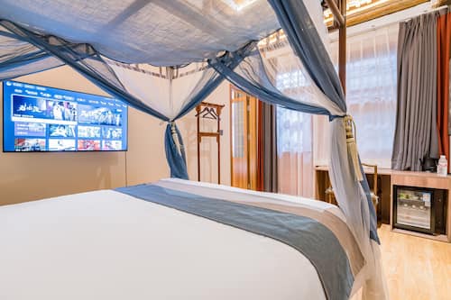 ห้องแฟมิลี่สวีท, 2 ห้องนอน, วิวสวนหย่อม | ผ้านวมขนเป็ด, เตียงเมมโมรีโฟม, Wi-Fi ฟรี, ผ้าปูที่นอน